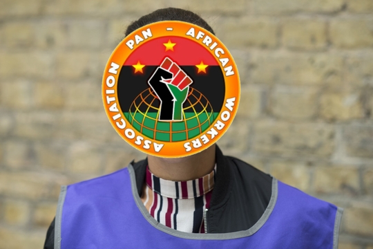 A person wearing a care workers tabbard standing in front of a brick background. Over their face is the Pan African Workers Association logo. A person wearing a care workers tabbard standing in front of a brick background. Over their face is the Pan African Workers Association logo.